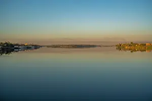 Stillness Prints: View of reflections in the Nile River at dawn at Al Daba Eya near Luxor