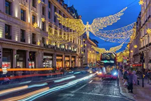 Westminster Prints: View of Regent Street shops and lights at Christmas