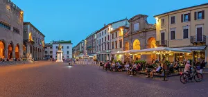 View of restaurant in Piazza Cavour in Rimini at dusk, Rimini, Emilia-Romagna, Italy, Europe