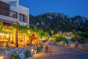 Kos Town Prints: View of restaurant in Zia Sunset View at dusk