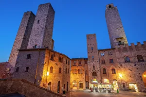 Eateries Prints: View of restaurants in Piazza del Duomo at dusk