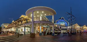 Chair Prints: View of restaurants in the Waterfront at dusk