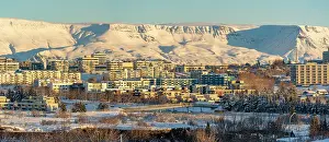 Amazing Prints: View of Reykjavik and mountains in background on a sunny day in winter from Kopavogskirkja