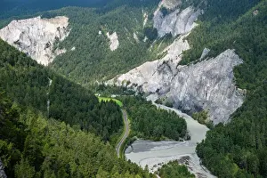 Altitude Prints: View of the Rhein gorge showcasing steep cliffs and winding river in Switzerland during the daytime