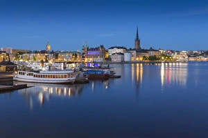 Stockholm Prints: View of Riddarholmen and Sodermalm at dusk from near Town Hall, Stockholm, Sweden