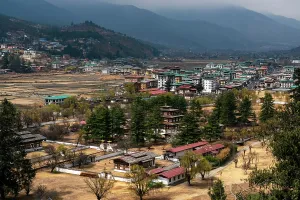 Bhutan Prints: View of rinpong dzong monastery and the surrounding landscape of paro, bhutan in daylight