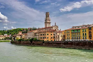 Pedestrian Prints: View of River Adige with buildings along the banks and the historical architecture of Verona in Italy