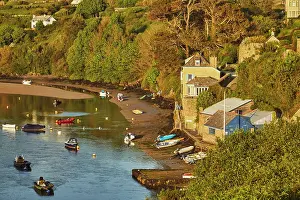 Estuary Prints: View of River Avon estuary at sunset with boats in Bantham, Devon, UK