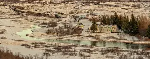 Wonderland Prints: View of river, chapel and houses in Thingvellir National Park