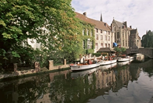 Bruge Prints: View along River Dijver towards Bridge of St. John of Nepomucenus, Bruges (Brugge)