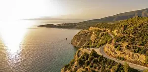 Thassos Prints: View of road and coastline at Northernmost point of Thassos island at sunset
