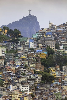Brazil Prints: View of Rocinha favela (slum) (shanty town), Corcovado mountain and the statue of