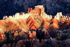 Dust Prints: View of rock formations and shadows in Bryce Canyon during sunset in Utah, USA