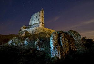 Polish Jura Prints: View of rocks and Mirow Castle ruins illuminated at night, Polish Jura, Poland, Europe