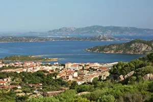 Sea View Prints: View from rocky hillside over town rooftops to the islands of Santo Stefano and Caprera