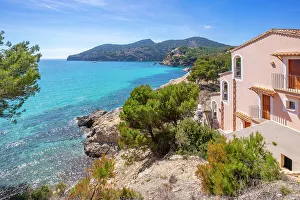 Terracotta Prints: View of rocky shoreline and turquoise sea at Camp de Mar