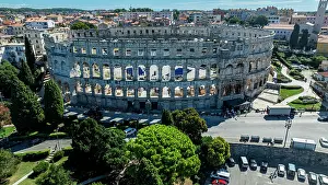 Roads Prints: View of the Roman amphitheatre in Pula from above showing architecture and surroundings in Croatia