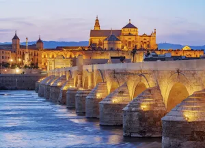 Cordoba Prints: View over Roman Bridge of Cordoba and Guadalquivir River towards the Mosque Cathedral