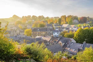 United Prints: View of rooftops and trees in autumn in Tideswell
