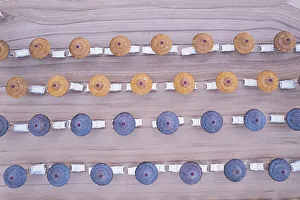 Sun Lounger Prints: View from above of rows of beach straw umbrellas on an sandy beach
