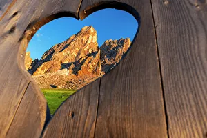 Dolomites Gallery: View of the Sass de Putia through a heart shaped hole at dusk, Passo delle Erbe, Dolomites