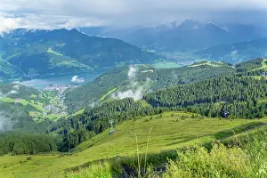 Skiing Prints: View from Schmittenhohebahn top station across Zell am See with clouds