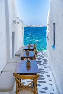 Chair Prints: View of sea and restaurant tables in Mykonos Town, Mykonos, Cyclades Islands
