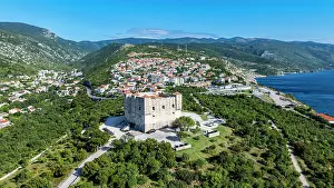 Spot Prints: View of Senj in Croatia with historical castle and green landscape near the coast