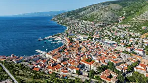 Roads Prints: View of Senj in Croatia showing buildings, marina, and coastal landscape on a clear day