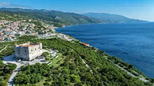 Hillsides Prints: View of Senj Croatia showing coastline and old stone tower