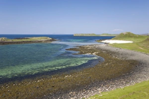 View over shore at low tide to distant Coral Beach, Claigan, near Dunvegan, Isle of Skye, Inner Hebrides, Highland, Scotland, United Kingdom, Europe