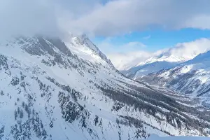 Courmayeur Prints: View of snow covered Aosta Valley and mountains from Pavillon du Mont Frety in winter