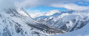 Courmayeur Prints: View of snow covered Aosta Valley and mountains from Pavillon du Mont Frety in winter