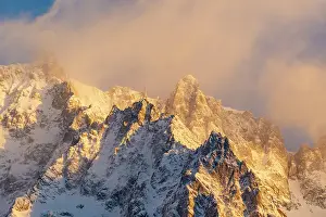 Chill Prints: View of snow covered mountains from Courmayeur at sunrise in winter