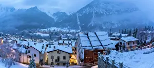 Cozy Prints: View of the snow covered town centre and mountainous background in winter