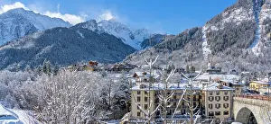 Courmayeur Prints: View of snow covered trees, mountains and Dolonne from Courmayeur in winter