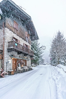 Cabin Prints: View of snow covered wooden houses in Entreves in winter