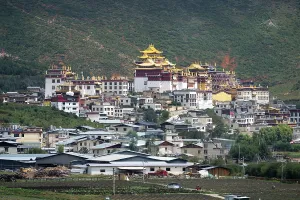 Large Prints: View of Songzanlin Monastery with golden roofs in Shangri-La Yunnan China