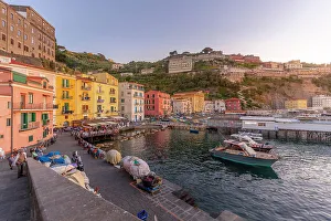 Sorrento Prints: View of Sorrento harbour and Bay of Naples at sunset