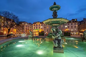 Romance Prints: View of South fountain of Rossio in Praca do Rossio at dusk, Lisbon, Portugal, Europe