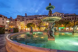 Aesthetics Prints: View of South fountain of Rossio in Praca do Rossio at dusk, Lisbon, Portugal, Europe