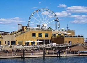 Ferris Wheel Collection: View over South Harbour towards Allas Sea Pool and Restaurand and SkyWheel Ferris Wheel, Helsinki