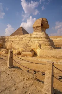 Relics Prints: View of the Sphinx at the Pyramids of Giza on a sunny day, Giza, Cairo, Egypt, Africa