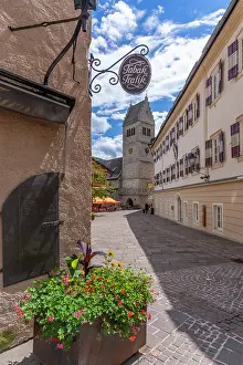 Cobblestones Prints: View of St. Hippolyte Church and Stadtplatz in Zell am See on a sunny day