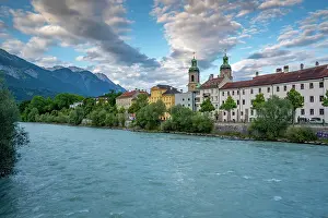Innsbruck Prints: View of St. Jakob Cathedral and colorful buildings near River Inn at golden hour in summer in Innsbruck