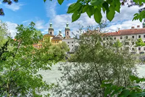 Sights Prints: View of St. Jakob Cathedral and colorful buildings near River Inn on a sunny summer day in Innsbruck