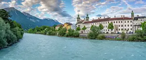 Innsbruck Prints: View of St. Jakob Cathedral and colorful buildings by River Inn at golden hour in summer in Innsbruck