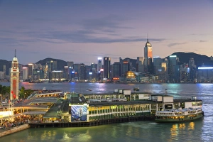 Ferry Terminal Prints: View of Star Ferry Terminal and Hong Kong Island skyline, Hong Kong, China, Asia