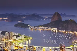 Pao De Acucar Prints: View of Sugar Loaf Mountain (Pao de Acucar) and Botafogo Bay at dusk
