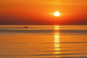 Rimini Prints: View of sunrise reflecting in the sea from Rimini Beach